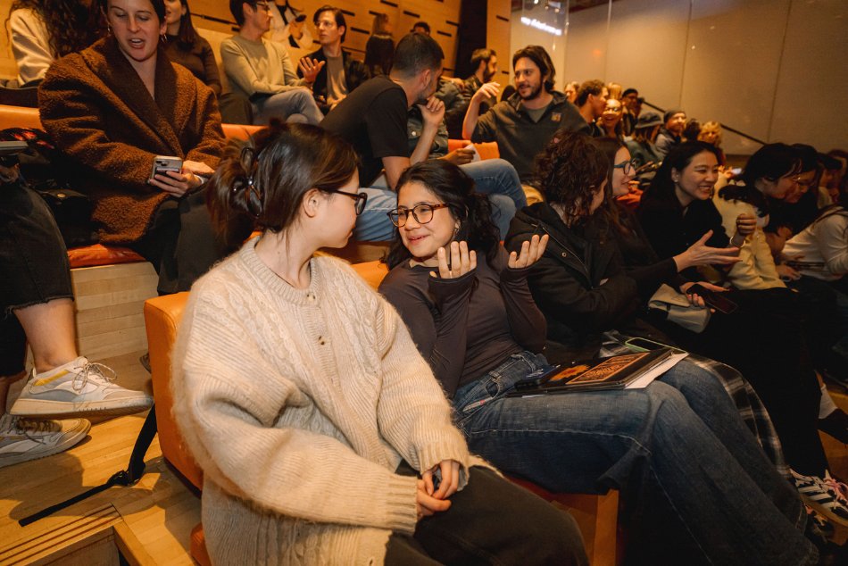 Audience members talking after the piece